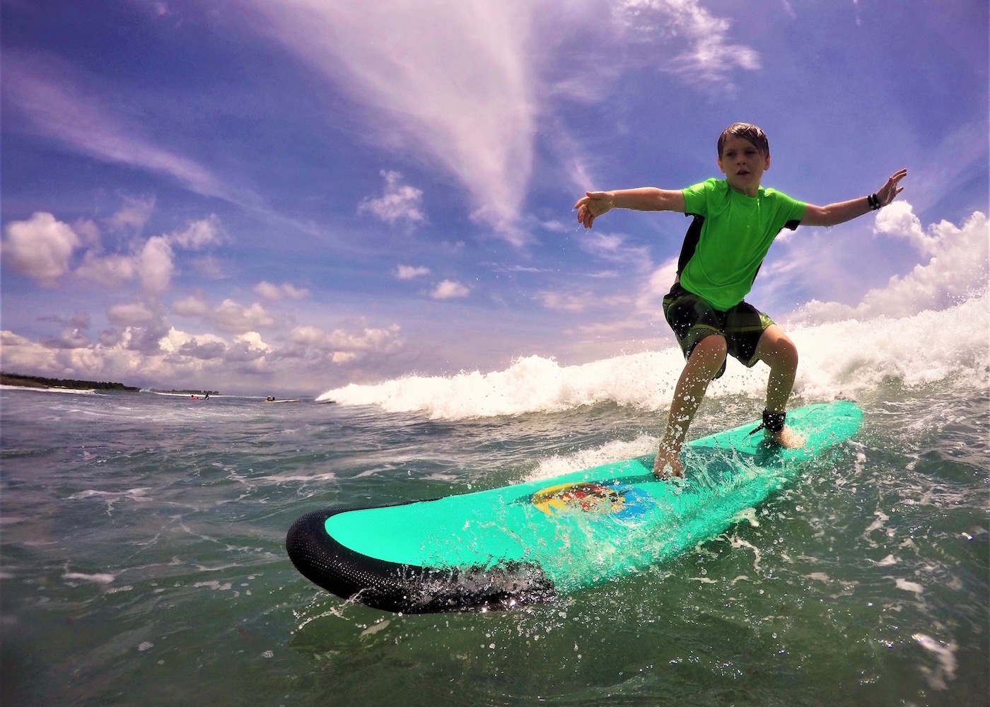 kids surfing with Thumbs up Surf Bali | one of the best things to do for kids in Bali Indonesia