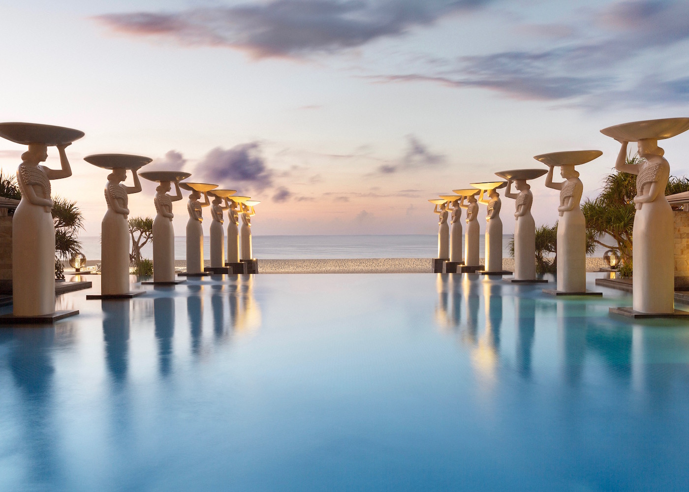 The infinity pool by Nusa Dua beach at Mulia Bali Indonesia resort