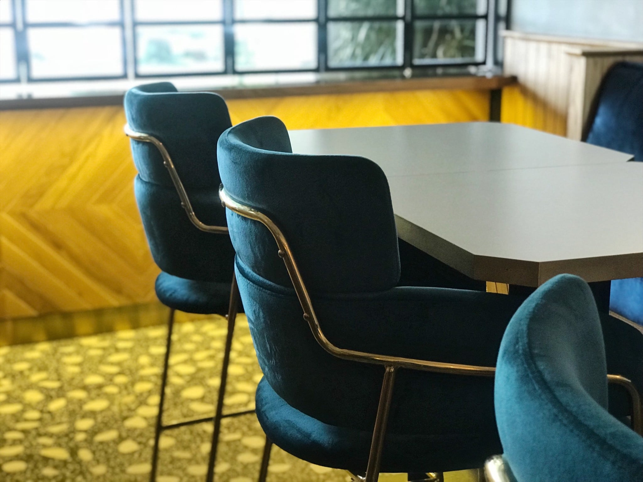 With blue velvet chairs in an art deco vibe, raw wood and a pebble patterned floor,Merci Marcel's Club Street branch is a little more masculine than its Tiong Bahru sister restaurant.