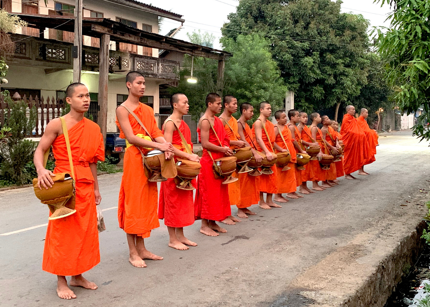 Almsgiving ceremony | Travel guide to Laos